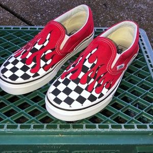 Checkered flames slip on vans